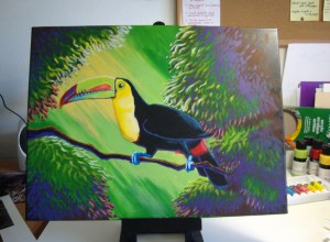More work on the foliage highlights, and work on the toucan's beak. Adjusting some shades of the bird's yellow chest. 